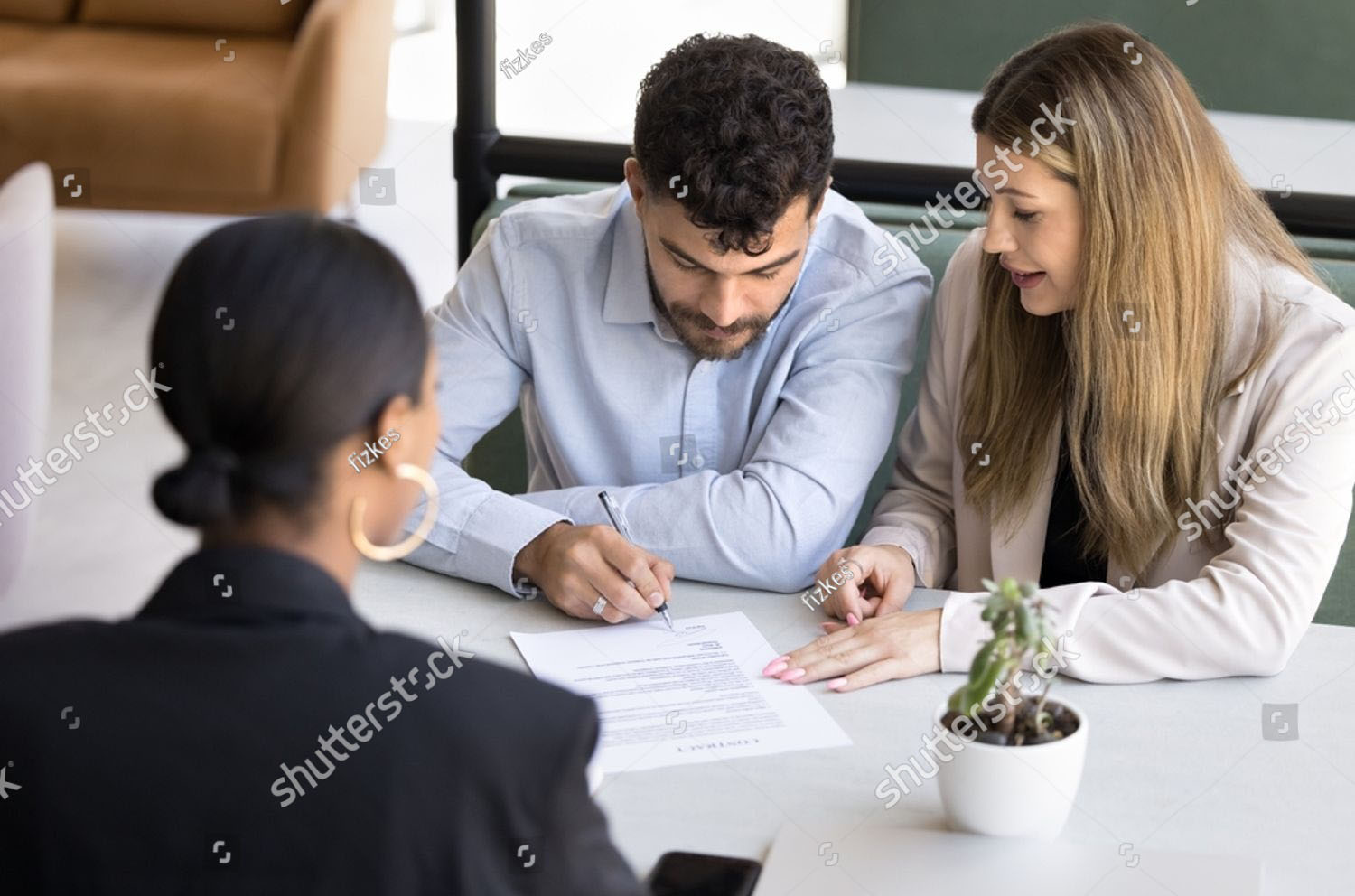 Stock Photo Focused Married Couple Signing Document Insurance Agreement Closing Real Estate Deal At Meeting 2451803327